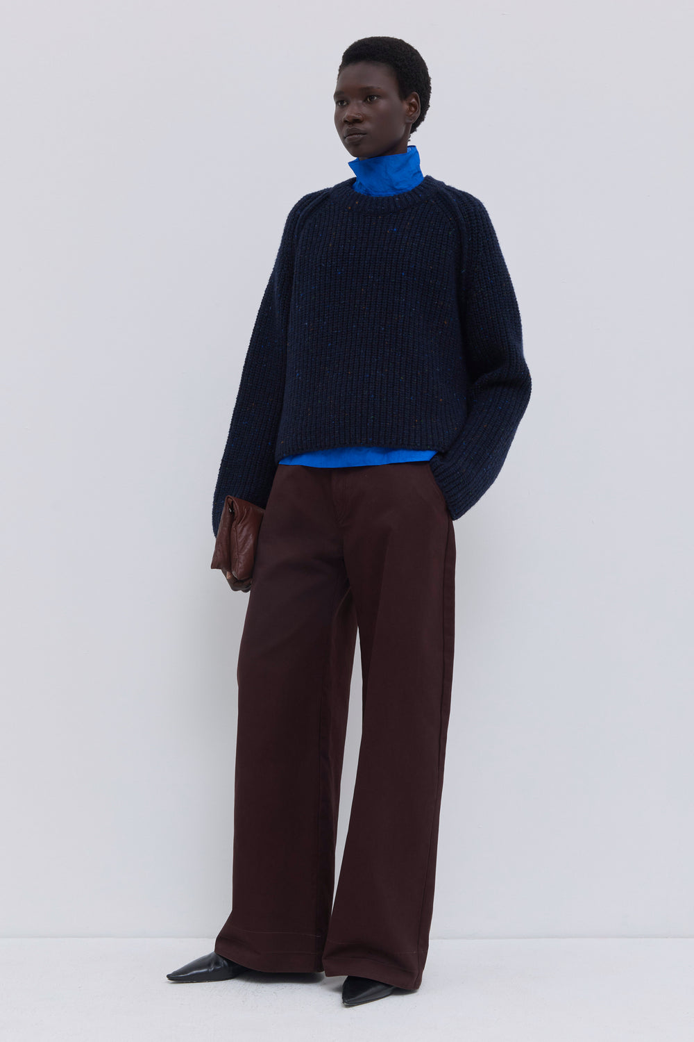 Front view of a chunky crewneck sweater in a textured Italian cashmere blend knit.