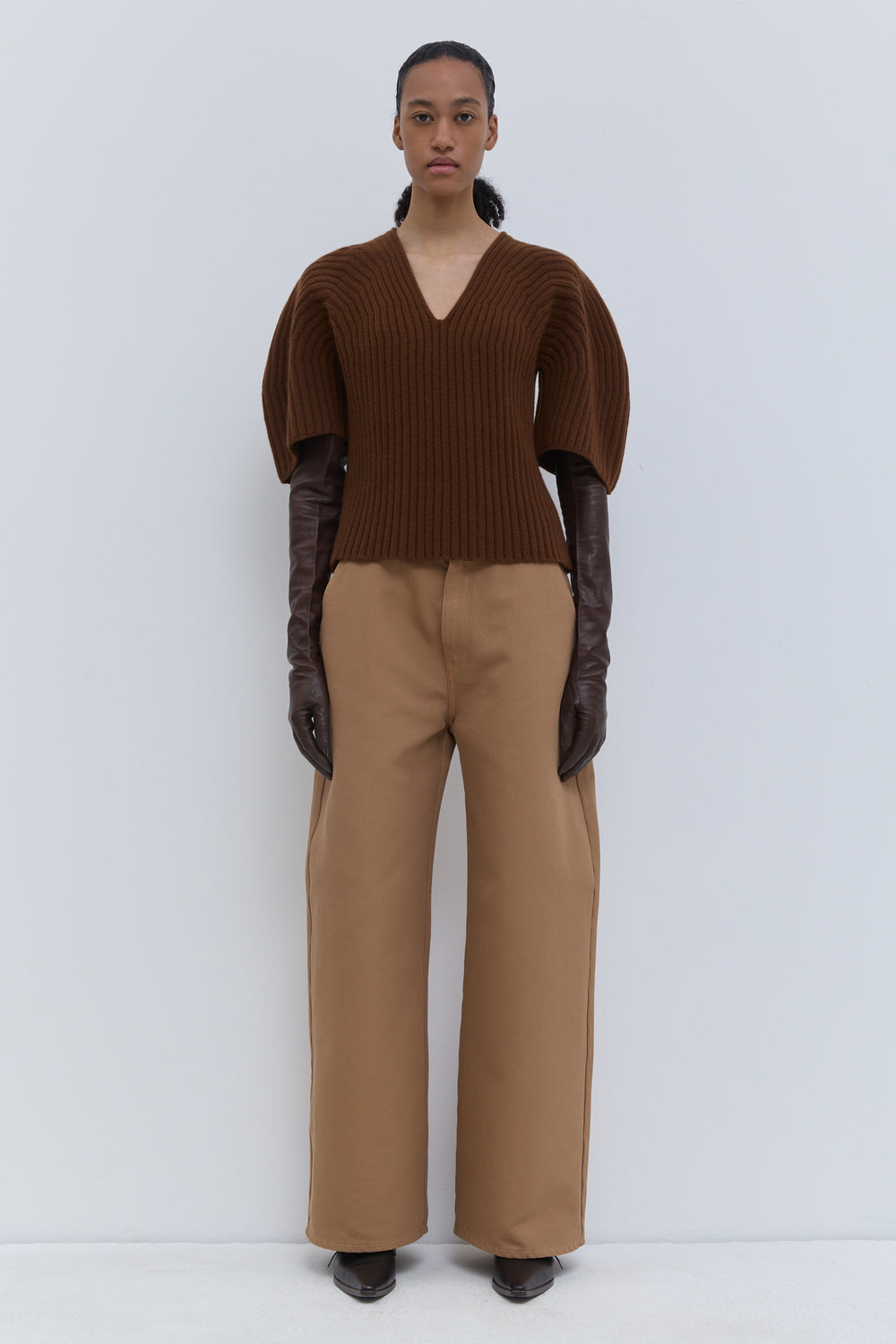 Rust knitted top with deep V-neck and short sleeves