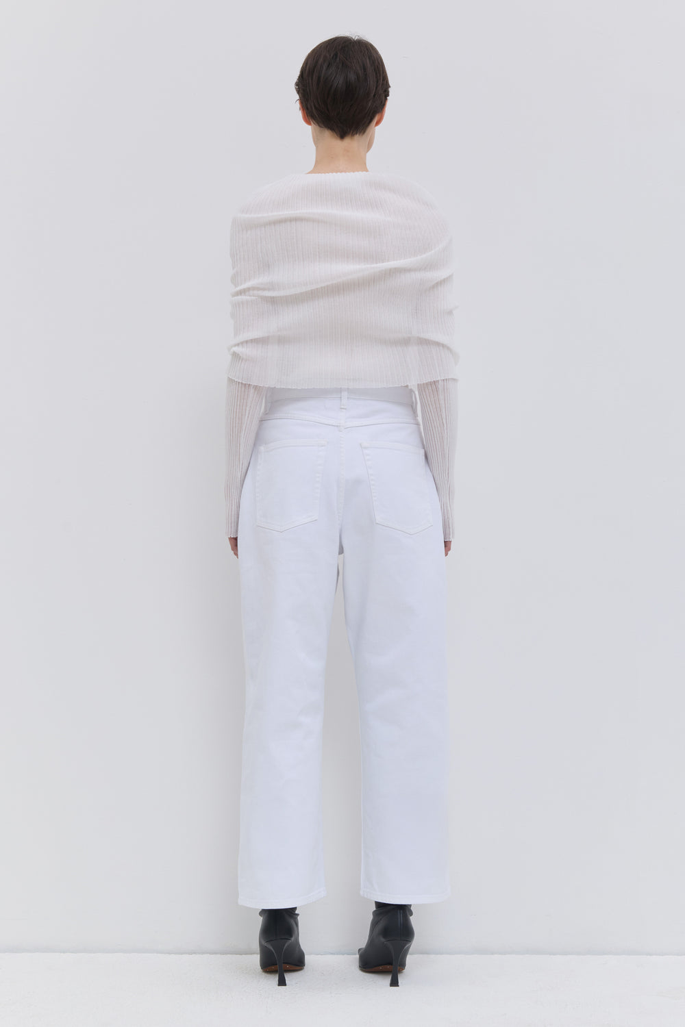 Front view of optical white wide-leg cropped denim jeans.