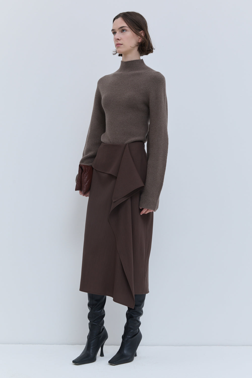 Christian Wijnants Sailo chestnut skirt with asymmetric layered detail, front view.
