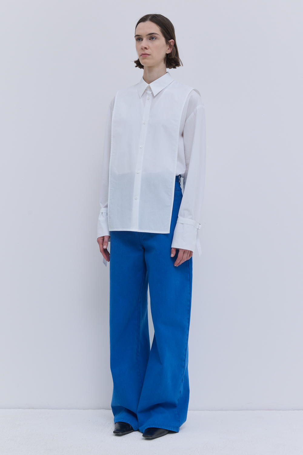 White organic cotton bib top with button front